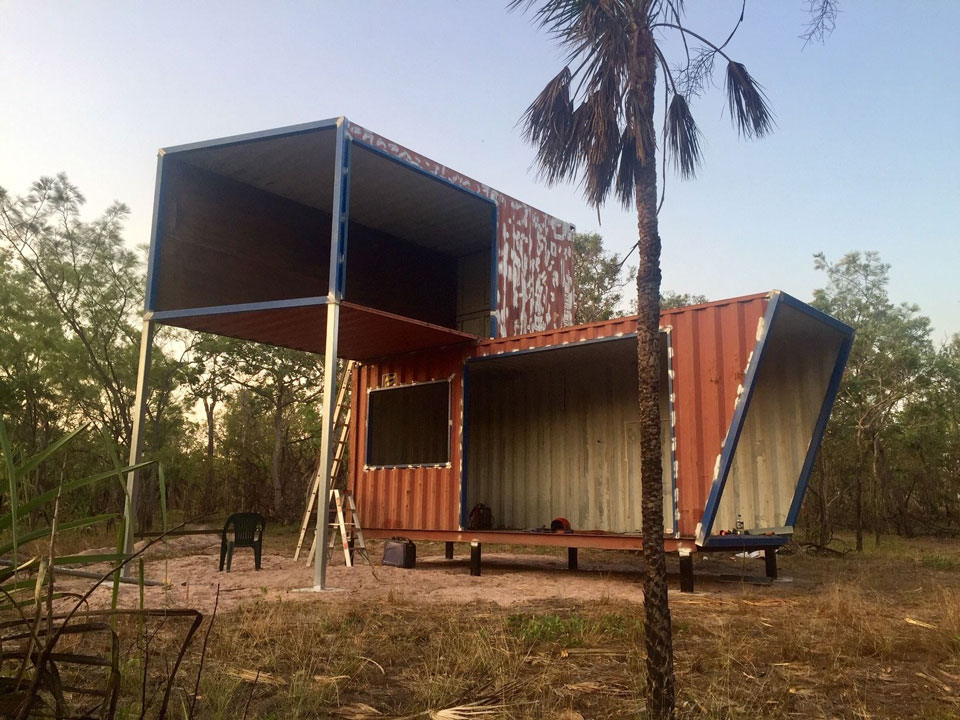 Containers placed on footings and welded together. Source: Domain