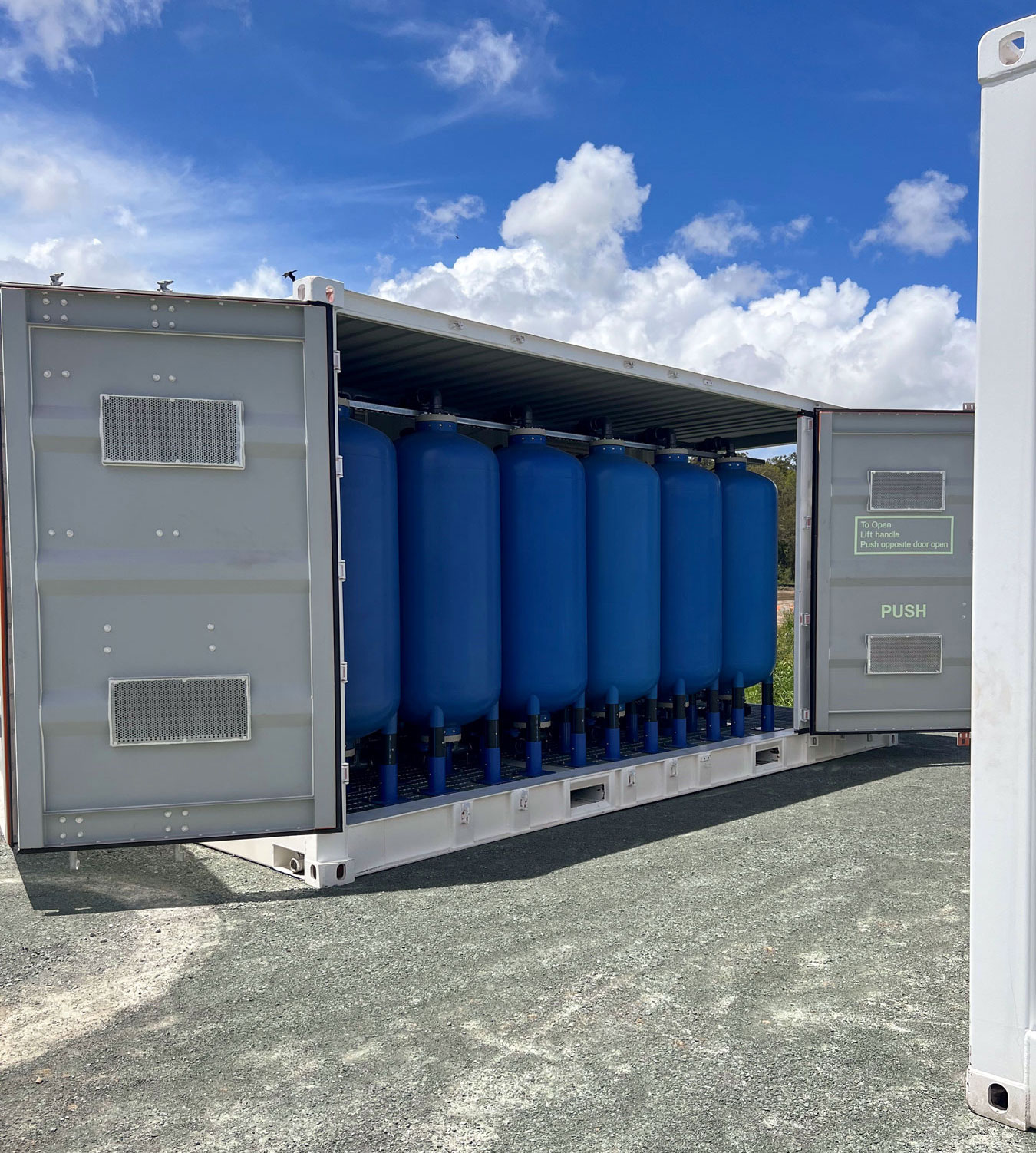 Water treatment equipment stored in a Dangerous Goods Container with a bund, to manage spills and leaks.