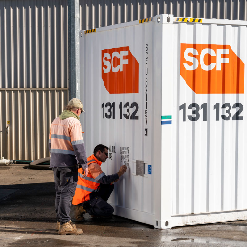 SCF workers servicing a 20ft container