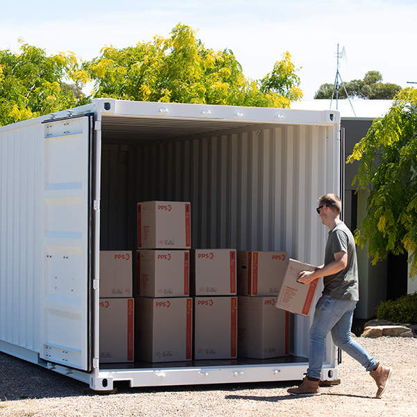 An SCF shipping container used for storage at a home.